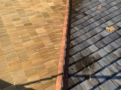Hamilton wood roof showing before and after cleaning results