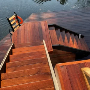 Hamilton dock and deck cleaning results featuring freshly cleaned hardwood stairs and platform overlooking the lake